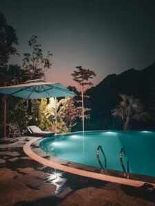 Toms Homestay pool with the Ha Giang mountains in the background